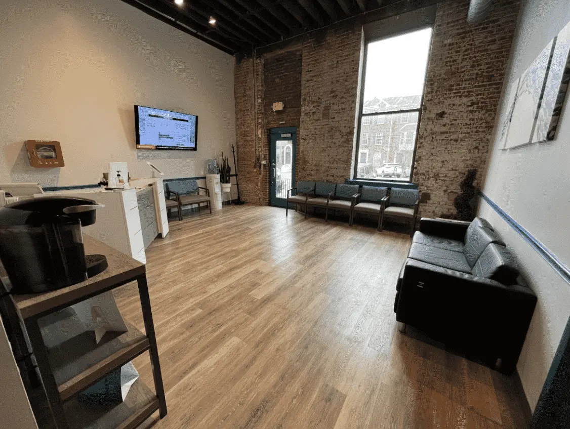 Spacious wooden floor sitting area